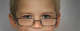 Kinderaugen mit Brille